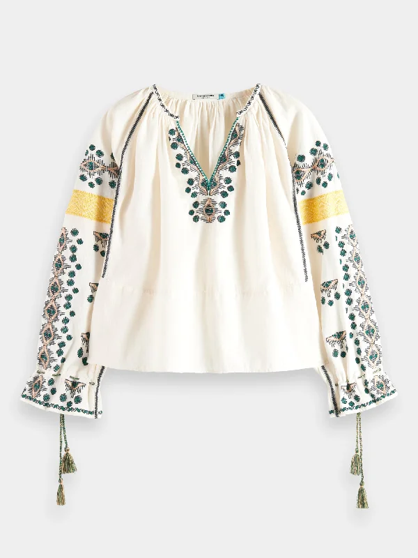 Embroidered linen-blend blouse